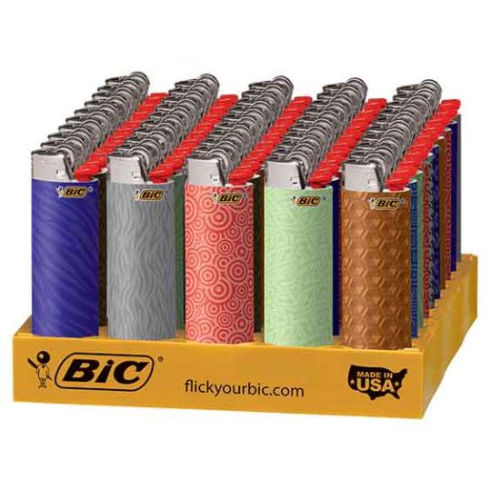 Bic Geometric lighters in a variety of designs in a store display tray.