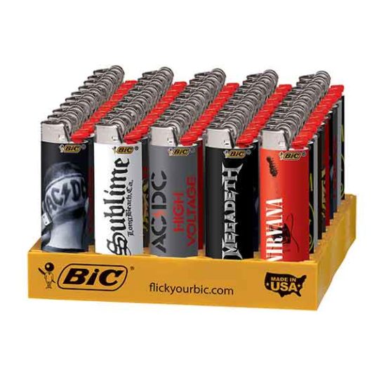 Bic Rock Band Royalty lighters in a variety of designs in a store display tray.