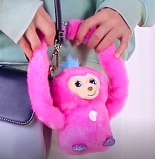 tumbling monkey on purse